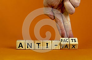 Anti-facts or anti-vax symbol. Doctor turns a cube, changes words `anti-vax` to `anti-facts`. Beautiful orange background. Cop