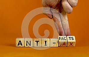 Anti-facts or anti-vax symbol. Doctor turns a cube, changes words `anti-vax` to `anti-facts`. Beautiful orange background. Cop