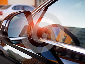 Anti-glare rearview mirror on a black car