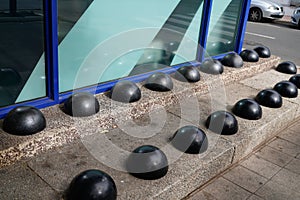 Anti-homeless spikes hostile architecture street furniture defensively designed against the homeless