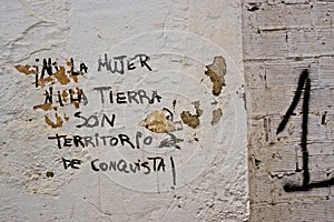 An anti imperialist and feminist graffiti on a wall