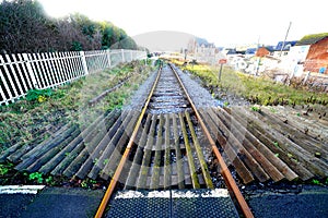 Anti trespass boards by train track photo