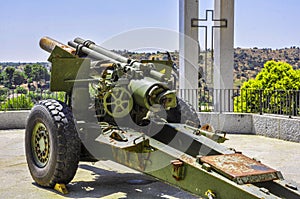 Antiaircraft gun with Christian Cross on the background