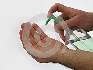 Antibacterial Sanitizer Gel Bottle Being Pumped by a Male Hand