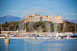 Antibes harbor, France, with yachts and Fort Carre