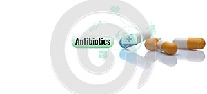 Antibiotic capsule pills on white background. Prescription drugs. Colorful capsule pills. Antibiotic drug. Pharmaceutical industry