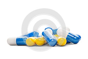 Antibiotic color pills on isolated white background