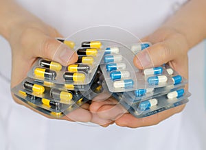 Antibiotic in hands.