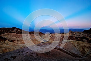 Anticrepuscular rays at Sunrise at Zabriskie Point, Death Valley