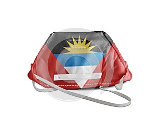 Antigua Barbuda flag on anti pollution mask medical protection