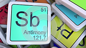 Antimony Sb block on the pile of periodic table of the chemical elements blocks. Chemistry related 3D rendering