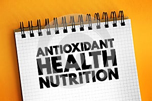 Antioxidant Health Nutrition text concept on notepad for presentations and reports