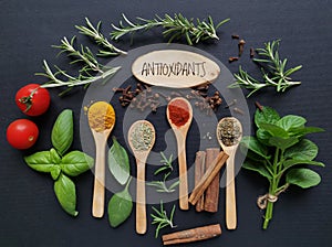 Antioxidant high food. Set of various spices and fresh herbs rich in antioxidants. Natural products containing antioxidants