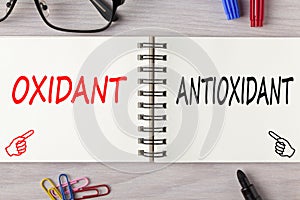 Antioxidant or oxidant written on notebook concept