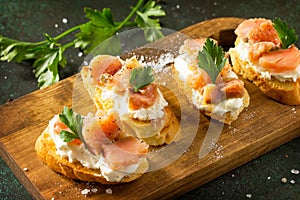 Antipasti snacks for Wine. Brushetta with Soft Cheese and Salmon