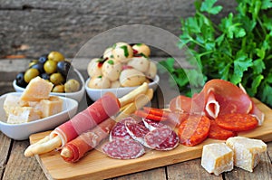 Antipasto, egg, olives, chesse, parma various appetizer food traditional
