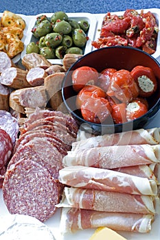 Antipasto; meat, olives, peppers, cheese