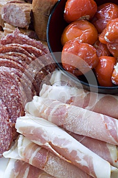 Antipasto; meats and stuffed peppers