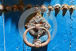 Antiqe Door knocker on the old door