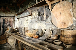 Antiquarian tableware in old kitchen. photo
