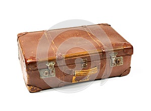 Antiquated and used suitcase photo