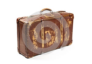 Antiquated and used suitcase photo