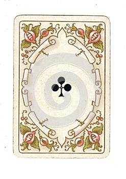 An antique ace of clubs playing card.