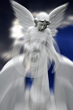 Antique Angel Statue With Heavenly Sky and Zoom Blur Representing Spiritual Visions and Help