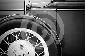 Antique Automobile Front Wheel and Fender in Black and White