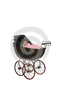 Antique baby carriage against high key background