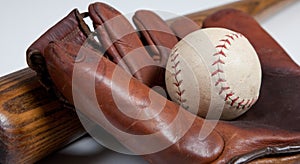 Antique baseball bat, mitt and ball