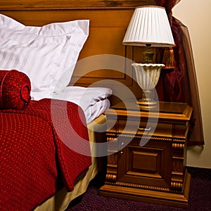 Antique bedside table and bed