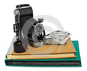 Antique, black, pocket camera, old photo albums, retro black and white photographs, historic negative for the camera.