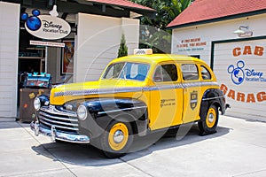 Antique black and yellow cab at WDW