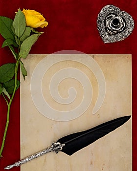 Vintage blank preachment, yellow rose, ornate silver quill stand and ornamented quill - Love letter concept