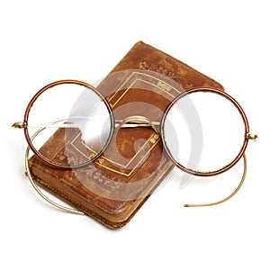Antique Book and Spectacles photo