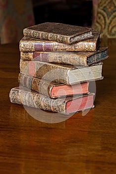 Antique books on a wooden table