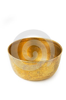 Antique brass bowl isolated on white background