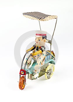 Antique brass doll: tricycle