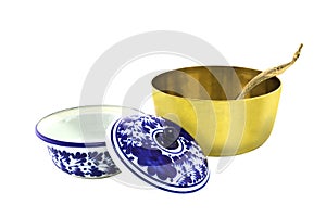 Antique brazen rice bowl and ceramic bowl isolated