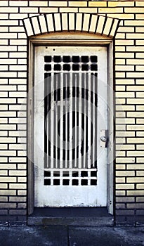 Antique british house door of brick building