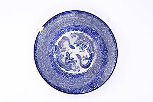 Antique broken blue Japanese plate repaired with gold kintsugi technique