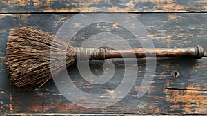 Vintage Broom on Rustic Wood