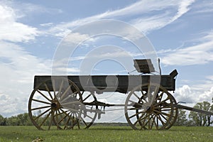 Antique buckboard sky background