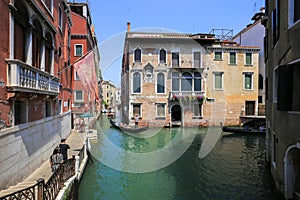 Antique building and water canal in Venice