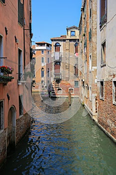 Antique building and water canal in Venice