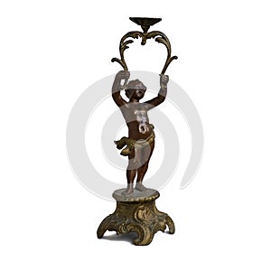 An antique candkestick in the shape of blackamoor, isolated