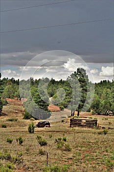 Antique Car and partial log cabin in Linden, Navajo County, Arizona, United States