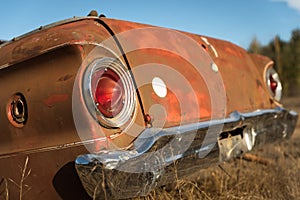 Antique car trunk in the farm field