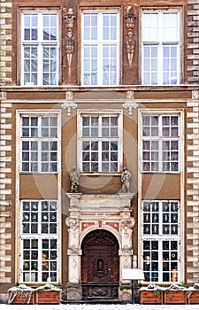 Antique carved wooden door of luxury gothic mansion